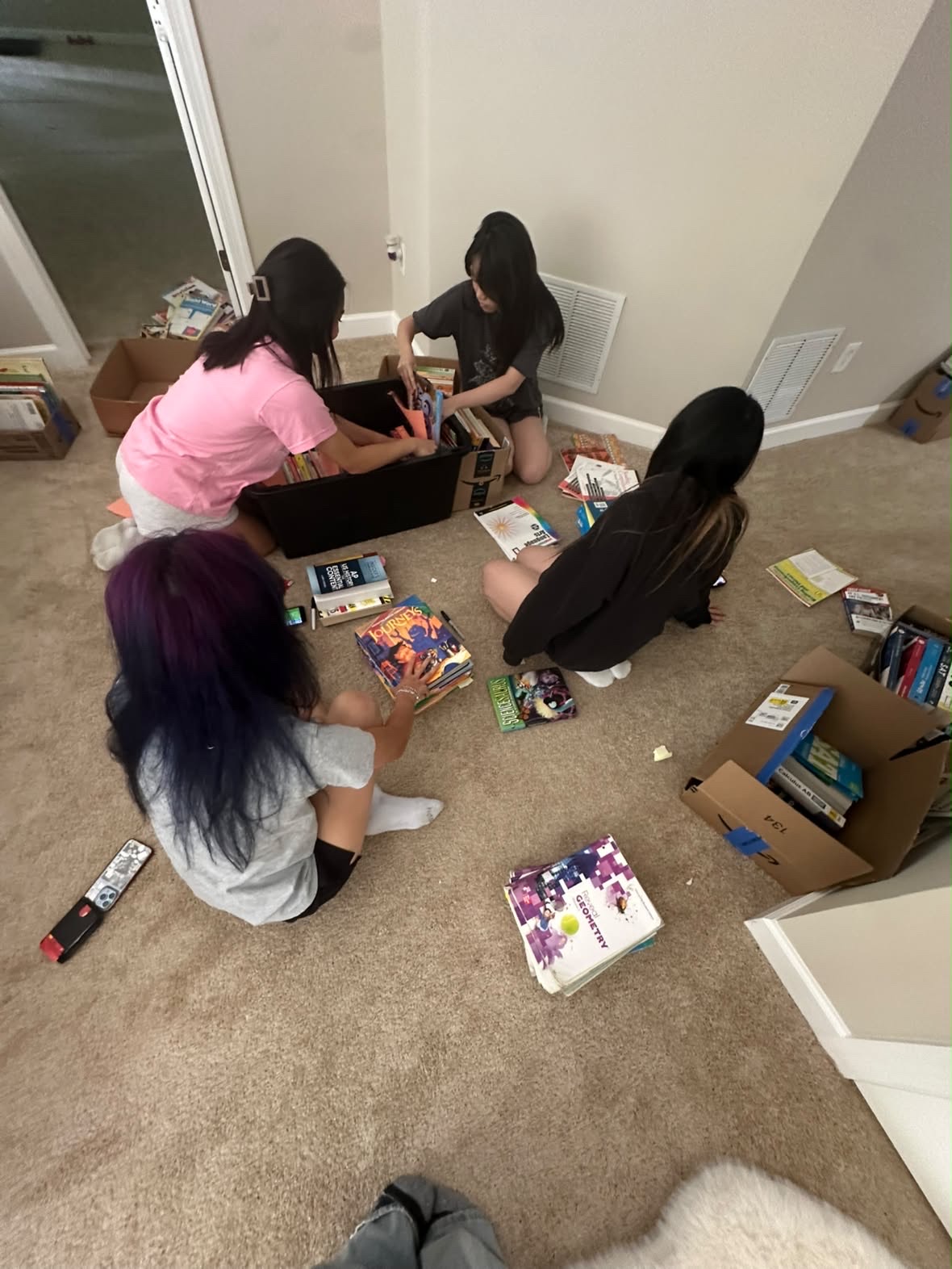 Students receiving educational resources from Literacy Cycle